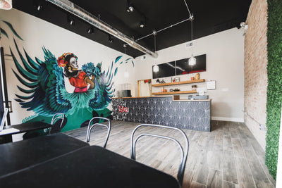 PORTAGE PARK EATERY, SALUD KITCHEN, OPENS ITS DOORS WITH A BREATHTAKING MURAL BY ARTIST RAWOOH
